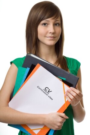 Young woman holding files and copy of her CV